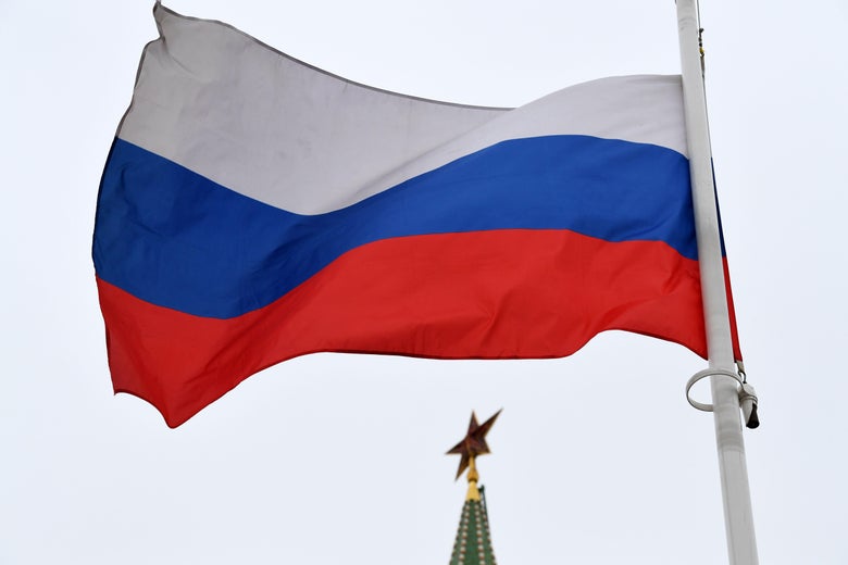 A Russian flag flies in front of a ruby star atop one of the Kremlin's towers in downtown Moscow on March 13, 2018.
Russia will hold presidential elections on March 18, 2018. / AFP PHOTO / Kirill KUDRYAVTSEV (Photo credit should read KIRILL KUDRYAVTSEV/AFP/Getty Images)